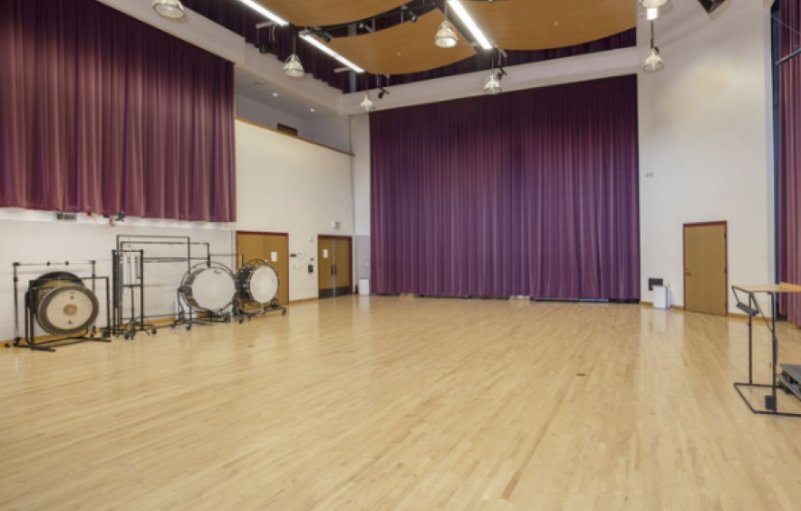 empty wood-floored rehearsal room