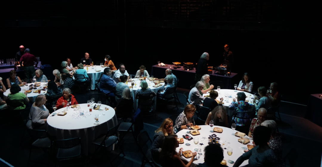 wide shot of crowded banquet tables